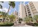 Beautiful building exterior with lush landscaping and blue skies at 6105 Bahia Del Mar Cir # 683, St Petersburg, FL 33715