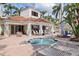 Inviting hot tub and comfortable lounge chairs offering a relaxing retreat within the elegant community pool area at 6105 Bahia Del Mar Cir # 683, St Petersburg, FL 33715