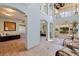 Lobby with tiled floors, elevator, bench and seating area at 6105 Bahia Del Mar Cir # 683, St Petersburg, FL 33715