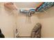 Storage closet with wire shelving, rolled carpet, and ladder at 6105 Bahia Del Mar Cir # 683, St Petersburg, FL 33715