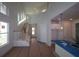 Bright, open-concept living room and kitchen area features lots of light and high ceilings at 648 Allora Ave, Nokomis, FL 34275