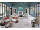 Stylish lobby area with fireplace, plush seating, and elegant decor, creating a welcoming atmosphere at 648 Allora Ave, Nokomis, FL 34275