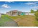 Spacious backyard with green lawn and privacy fence at 6937 Gideon Cir, Zephyrhills, FL 33541