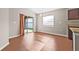 Bright dining area with sliding glass doors to the patio and wood floors, perfect for relaxed meals at 6937 Gideon Cir, Zephyrhills, FL 33541