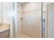 Shower with tiled surround and built-in niche at 6937 Gideon Cir, Zephyrhills, FL 33541