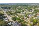 Aerial view of a neighborhood featuring mature trees and well-maintained homes at 702 W Virginia Ave, Tampa, FL 33603