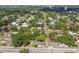 A neighborhood aerial shot featuring tree-lined streets and mixed architectural styles at 702 W Virginia Ave, Tampa, FL 33603