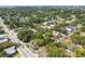 An aerial view of a neighborhood featuring mature trees and well-maintained homes at 702 W Virginia Ave, Tampa, FL 33603