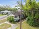 Quaint older home viewed from above with street intersection and neighboring homes at 702 W Virginia Ave, Tampa, FL 33603