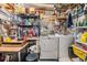 A laundry room featuring a washer, dryer, shelving, and lots of storage space at 7053 El Conquistador St, Zephyrhills, FL 33541