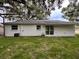 Spacious backyard with lush green grass and privacy at 733 Holly Ter, Brandon, FL 33511