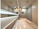This bathroom features a unique marbled sink, gold accents, and attractive pendant lighting at 733 Holly Ter, Brandon, FL 33511