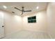 Bedroom with cozy ceiling fan, bright recessed lighting, and a medium-sized window at 733 Holly Ter, Brandon, FL 33511