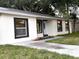 Charming single-story home featuring updated windows and freshly landscaped yard at 733 Holly Ter, Brandon, FL 33511