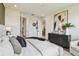 Inviting bedroom showcases a stylish dresser, comfortable bed, and modern artwork at 755 Maldives Trl, Sarasota, FL 34234
