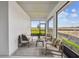 Inviting screened patio with comfortable seating and views of the expansive backyard at 755 Maldives Trl, Sarasota, FL 34234