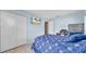 Bedroom with a bed, closet, and a TV mounted on the wall at 812 Regent Circle S, Brandon, FL 33511