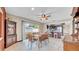 Open dining area with a view of the kitchen and access to the backyard at 812 Regent Circle S, Brandon, FL 33511