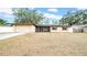 Charming single-story home featuring brick accents, a well-maintained lawn, and an attached garage at 812 Regent Circle S, Brandon, FL 33511