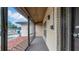 A screened in porch with brick accents, privacy screen, and outdoor lighting at 812 Regent Circle S, Brandon, FL 33511