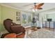 Relaxing bedroom featuring a massage chair, exercise equipment, and lots of natural light at 834 26Th N Ave, St Petersburg, FL 33704