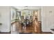 Inviting dining room with hardwood floors, chandelier, and natural light from the surrounding windows at 834 26Th N Ave, St Petersburg, FL 33704