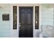 Close-up of a front door with stained glass accents and decorative details at 834 26Th N Ave, St Petersburg, FL 33704