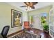 Bright home office boasts a ceiling fan, natural light, and hardwood floors at 834 26Th N Ave, St Petersburg, FL 33704
