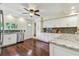 Bright kitchen featuring granite countertops, white cabinets, and stainless steel appliances at 834 26Th N Ave, St Petersburg, FL 33704