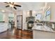 Bright kitchen featuring stainless steel appliances, gray backsplash, and granite countertops at 834 26Th N Ave, St Petersburg, FL 33704