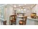 View of kitchen area with granite counters, bar seating and stainless appliances at 834 26Th N Ave, St Petersburg, FL 33704