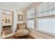 Comfortable sitting nook with a cushioned chair near a window, perfect for reading or relaxing at 834 26Th N Ave, St Petersburg, FL 33704