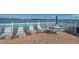 Expansive patio with lounge seating and tables, perfect for enjoying waterfront views and outdoor living at 845 S Gulfview Blvd # 110, Clearwater Beach, FL 33767