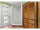 Bathroom with a stand up shower, wooden closet, and a door for convenience at 10512 Red Coach St, Spring Hill, FL 34608