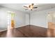 Large room with hardwood floors and many closets at 10512 Red Coach St, Spring Hill, FL 34608