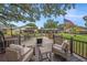 Inviting backyard deck with comfortable seating and open views perfect for outdoor relaxation at 1179 Lazy Lake W Rd, Dunedin, FL 34698