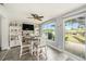 Dining area featuring dining table and chairs, and an outdoor patio at 1179 Lazy Lake W Rd, Dunedin, FL 34698