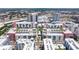 Aerial view of a building with multiple balconies and a rooftop patio at 1208 E Kennedy Blvd # 831, Tampa, FL 33602