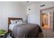 Bright bedroom featuring a queen-size bed and neutral colors at 1208 E Kennedy Blvd # 831, Tampa, FL 33602
