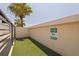 A designated pet area with artificial turf and a clear sign ensures a clean and pet-friendly environment for residents at 1208 E Kennedy Blvd # 831, Tampa, FL 33602