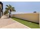The dog run features well-maintained artificial turf along a smooth brick pathway under a clear blue sky at 1208 E Kennedy Blvd # 831, Tampa, FL 33602