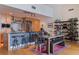 Modern kitchen with stainless steel appliances, island seating, and a dining area at 1208 E Kennedy Blvd # 831, Tampa, FL 33602