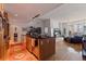 Open concept kitchen and living area with hardwood floors and plenty of natural light at 1208 E Kennedy Blvd # 831, Tampa, FL 33602