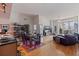 Open-concept living and dining area with hardwood floors and modern decor at 1208 E Kennedy Blvd # 831, Tampa, FL 33602