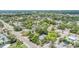 Aerial view of the neighborhood highlighting the proximity of tree-lined streets and mature landscaping at 1225 15Th St, Palm Harbor, FL 34683