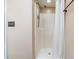 Bathroom with walk-in shower and white shower curtain at 1225 15Th St, Palm Harbor, FL 34683