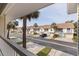 Charming townhouse complex showcasing manicured lawns and palm trees at 12321 Sun Vista W Ct # 52, Treasure Island, FL 33706
