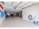 Spacious garage with epoxy floor, storage, and ample room at 12321 Sun Vista W Ct # 52, Treasure Island, FL 33706