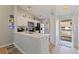 Open kitchen with white countertops, stainless steel appliances, and updated backsplash at 12321 Sun Vista W Ct # 52, Treasure Island, FL 33706