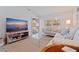 Comfortable living room featuring ample seating and natural light at 12321 Sun Vista W Ct # 52, Treasure Island, FL 33706